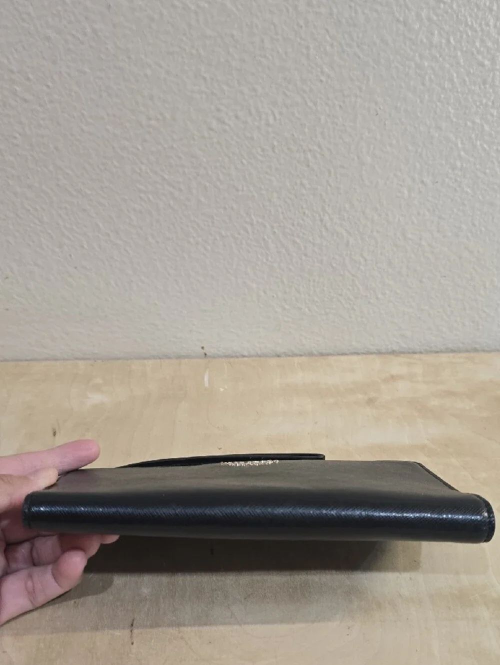 kate spade Black Zip-Around Saffiano Wallet with Pink Accent